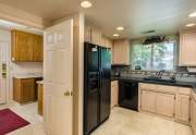 Custom-designed-kitchen-opens-to-large-laundry-room